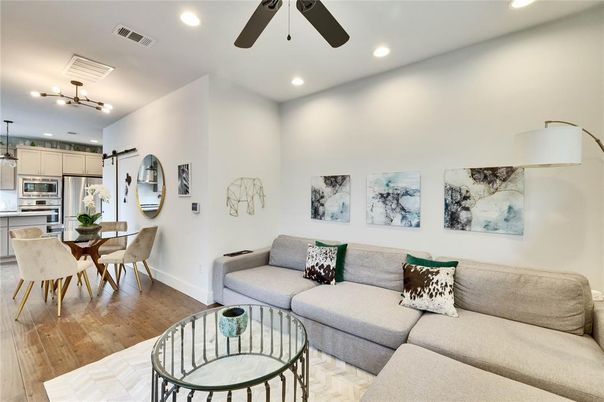 Dining room, Interior, Kitchen, Living room, Pendant Lights, Recessed Lighting, Stainless Steel Appliances, Wood Texture Flooring