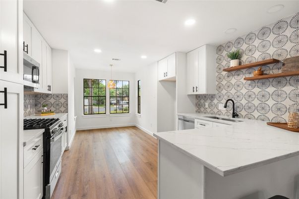 Interior, Kitchen, Pendant Lights, Recessed Lighting, Stainless Steel Appliances, Wood Texture Flooring