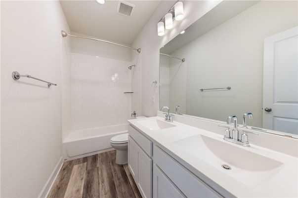 Bathroom, Dual Sink Vanities, Interior, Recessed Lighting, Wood Texture Flooring