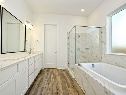 Bathroom, Dual Sink Vanities, Glass Shower, Interior, Marble Walls, Recessed Lighting, Wood Texture Flooring