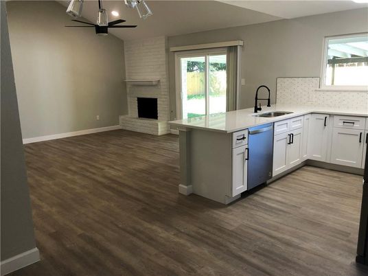 Fireplace, Interior, Kitchen, Recessed Lighting, Stone Walls, Wood Texture Flooring