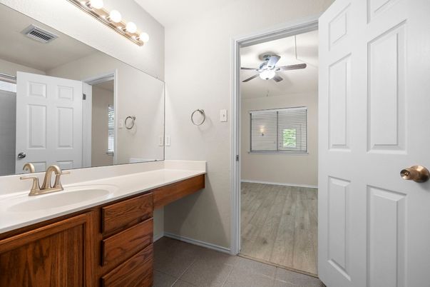 Bathroom, Dual Sink Vanities, Glass Shower, Interior, Wood Texture Flooring