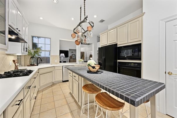 Interior, Kitchen, Recessed Lighting, Tile Countertops