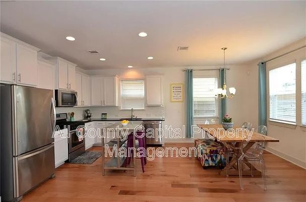 Chandelier, Dining room, Interior, Kitchen, Recessed Lighting, Stainless Steel Appliances, Wood Texture Flooring