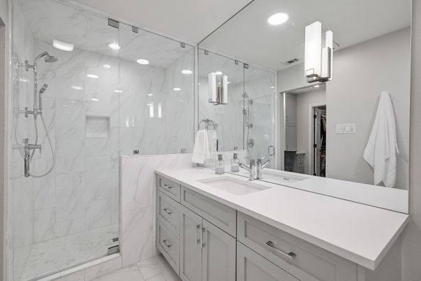 Bathroom, Dual Sink Vanities, Glass Shower, Interior, Marble, Marble Walls, Recessed Lighting