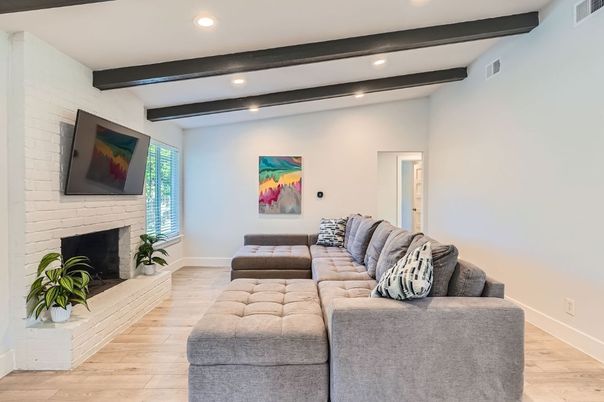Fireplace, Interior, Living room, Recessed Lighting, Stone Walls, Wooden Beams, Wood Texture Flooring