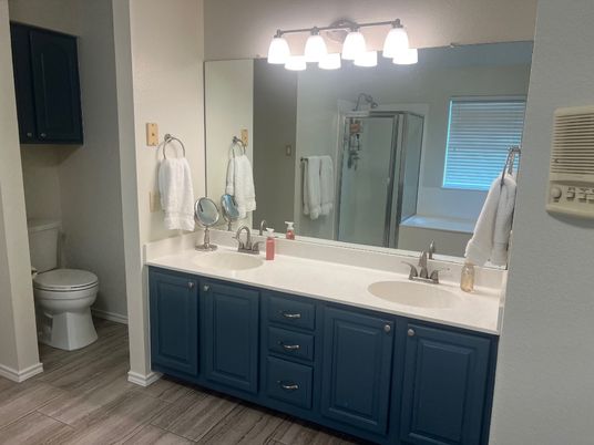 Bathroom, Dual Sink Vanities, Glass Shower, Interior, Wood Texture Flooring