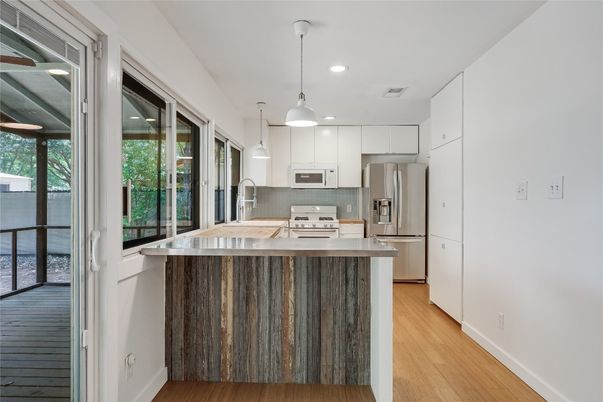 Interior, Kitchen, Pendant Lights, Recessed Lighting, Stainless Steel Appliances, Wood Texture Flooring
