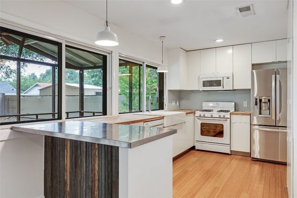 Interior, Kitchen, Pendant Lights, Recessed Lighting, Stainless Steel Appliances, Wood Texture Flooring
