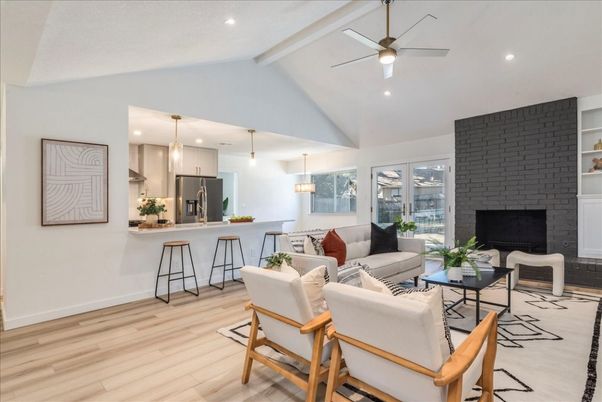 Fireplace, Interior, Kitchen, Living room, Pendant Lights, Recessed Lighting, Stainless Steel Appliances, Stone Walls, Wood Texture Flooring