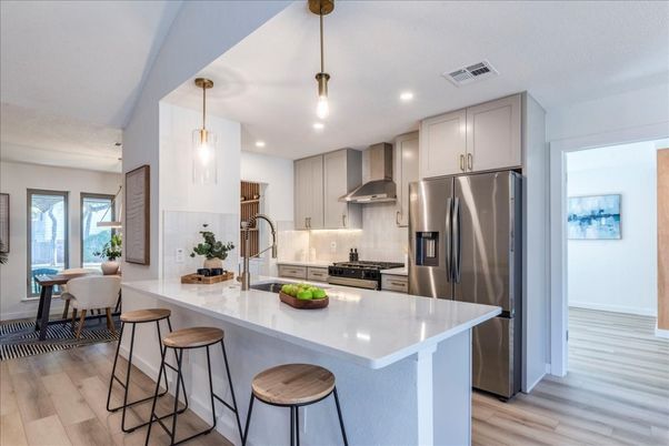 Dining room, Interior, Kitchen, Pendant Lights, Recessed Lighting, Stainless Steel Appliances, Wood Texture Flooring