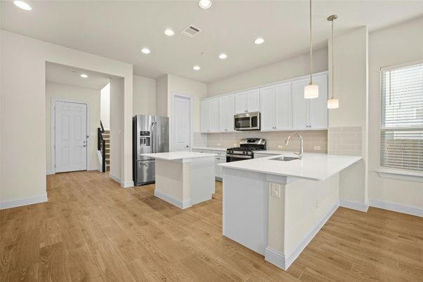 Interior, Kitchen, Pendant Lights, Recessed Lighting, Stainless Steel Appliances, Wood Texture Flooring