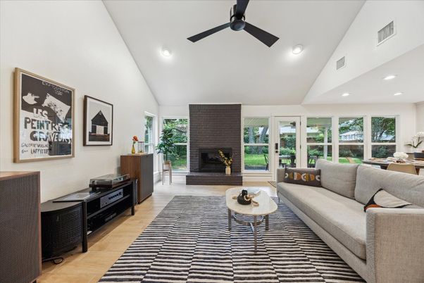 Dining room, Fireplace, Interior, Living room, Recessed Lighting, Wood Texture Flooring