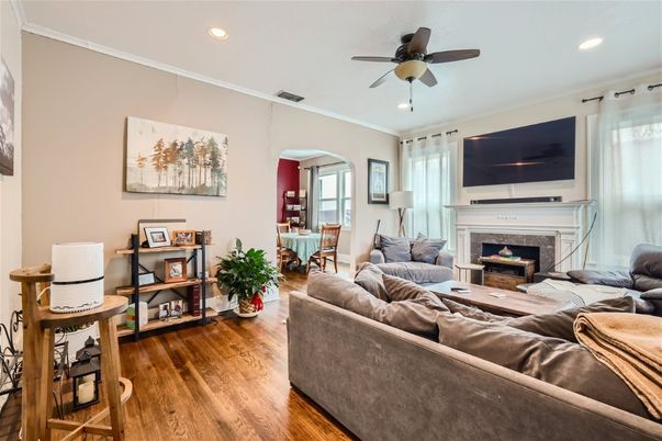 Dining room, Fireplace, Interior, Living room, Recessed Lighting, Wood Texture Flooring