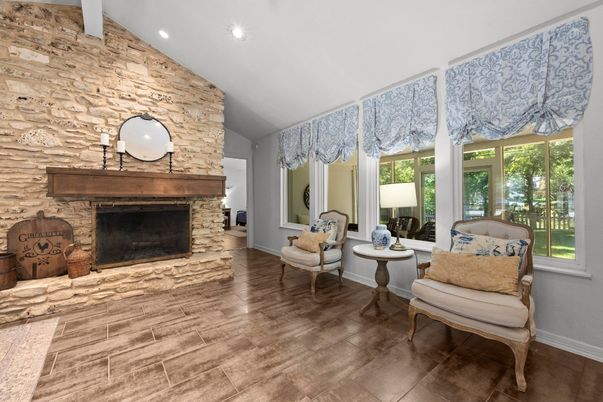 Fireplace, Interior, Living room, Recessed Lighting, Stone Walls, Wood Texture Flooring