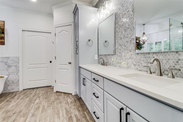 Bathroom, Dual Sink Vanities, Interior, Pendant Lights, Recessed Lighting, Wood Texture Flooring