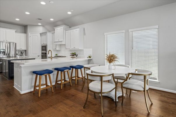 Dining room, Interior, Kitchen, Recessed Lighting, Stainless Steel Appliances, Wood Texture Flooring