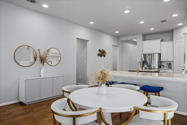 Dining room, Interior, Kitchen, Recessed Lighting, Stainless Steel Appliances, Wood Texture Flooring