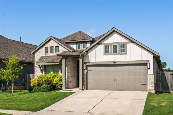 Attached, Exterior, Facade, Brick Traditional