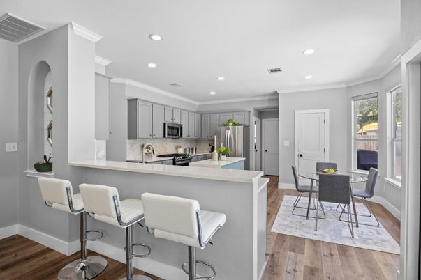 Dining room, Interior, Kitchen, Recessed Lighting, Stainless Steel Appliances, Wood Texture Flooring