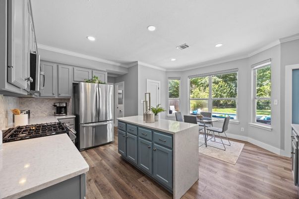 Dining room, Interior, Kitchen, Recessed Lighting, Stainless Steel Appliances, Wood Texture Flooring