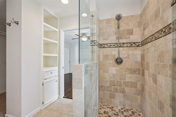 Bathroom, Glass Shower, Interior, Recessed Lighting, Stone Walls, Wood Texture Flooring