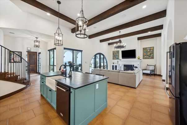 Chandelier, Fireplace, Interior, Kitchen, Living room, Pendant Lights, Recessed Lighting, Wooden Beams