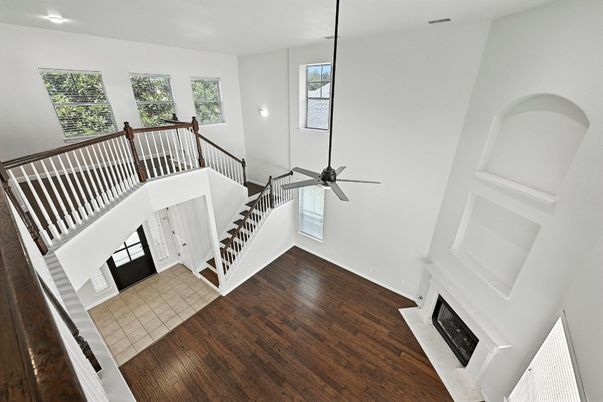 Fireplace, Interior, Pendant Lights, Recessed Lighting, Wood Texture Flooring