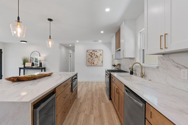 Interior, Kitchen, Marble Walls, Pendant Lights, Recessed Lighting, Wood Texture Flooring