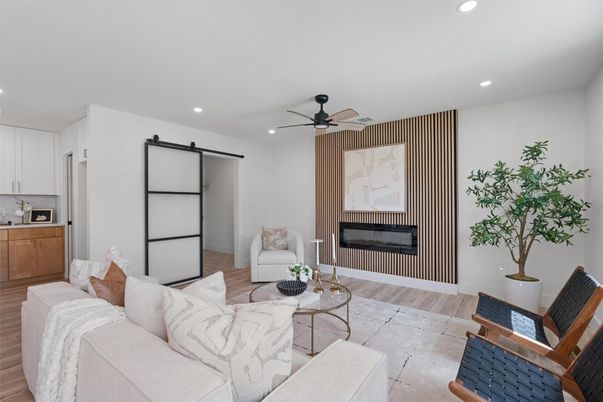 Fireplace, Interior, Living room, Recessed Lighting, Wood Texture Flooring