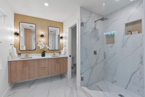 Bathroom, Dual Sink Vanities, Glass Shower, Interior, Marble, Marble Walls, Recessed Lighting