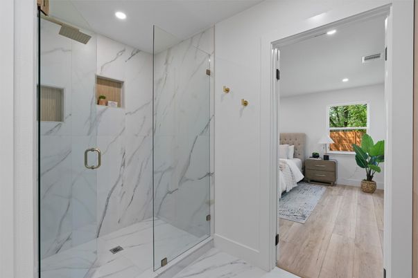 Bathroom, Bedroom, Glass Shower, Interior, Marble, Marble Walls, Recessed Lighting, Wood Texture Flooring