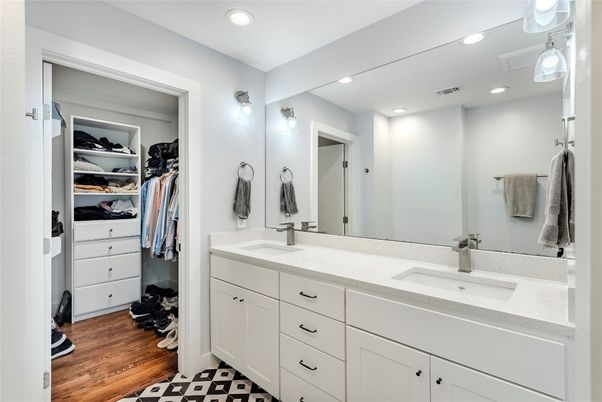 Bathroom, Dual Sink Vanities, Interior, Recessed Lighting, Walk-in Closets, Wood Texture Flooring
