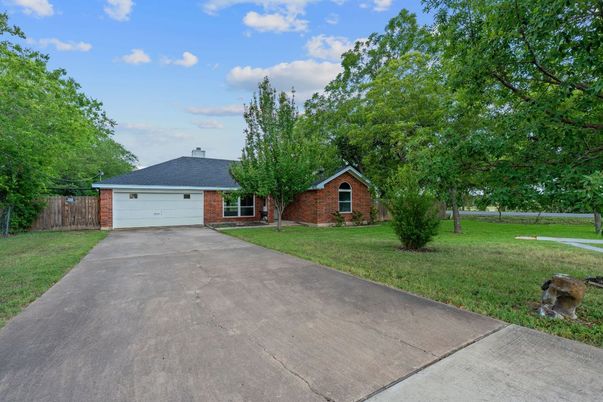 Attached, Backyard, Exterior, Facade, Brick Facade, Ranch