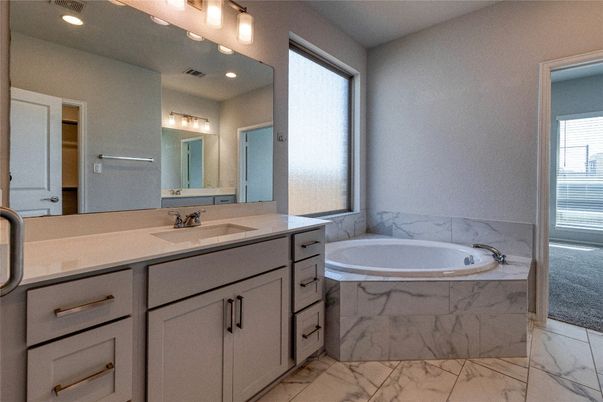 Bathroom, Dual Sink Vanities, Interior, Marble, Marble Walls, Recessed Lighting