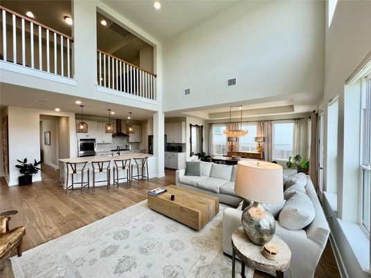 Dining room, Interior, Kitchen, Living room, Pendant Lights, Recessed Lighting, Stainless Steel Appliances, Wood Texture Flooring