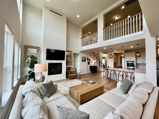 Fireplace, Interior, Kitchen, Living room, Pendant Lights, Recessed Lighting, Stainless Steel Appliances, Wood Texture Flooring