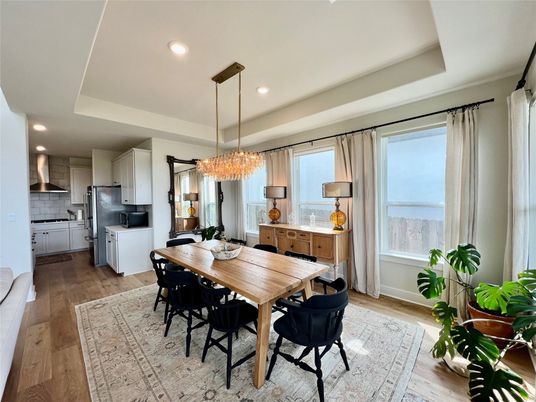 Chandelier, Dining room, Interior, Kitchen, Pendant Lights, Recessed Lighting, Stainless Steel Appliances, Wood Texture Flooring