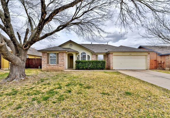 Attached, Backyard, Exterior, Facade, Brick Facade, Ranch