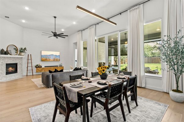 Dining room, Fireplace, Interior, Living room, Pendant Lights, Recessed Lighting, Wood Texture Flooring