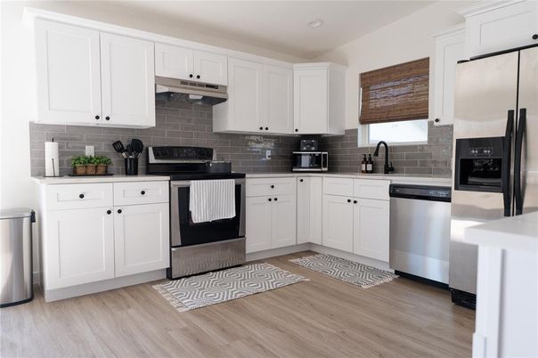 Interior, Kitchen, Recessed Lighting, Stainless Steel Appliances, Wood Texture Flooring