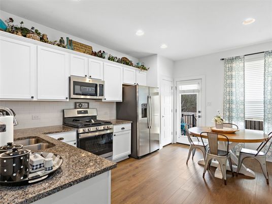 Dining room, Interior, Kitchen, Recessed Lighting, Stainless Steel Appliances, Wood Texture Flooring