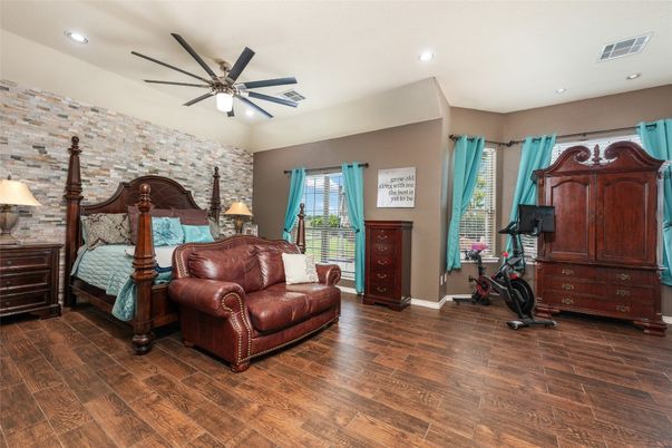 Bedroom, Fitness Equipment, Interior, Recessed Lighting, Stone Walls, Wood Texture Flooring