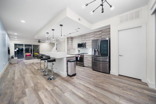 Interior, Kitchen, Pendant Lights, Recessed Lighting, Stainless Steel Appliances, Wood Texture Flooring