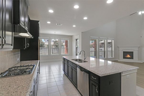 Chandelier, Fireplace, Interior, Kitchen, Recessed Lighting, Stainless Steel Appliances