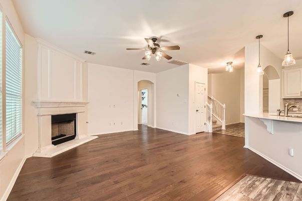 Empty room, Fireplace, Interior, Kitchen, Pendant Lights, Wood Texture Flooring