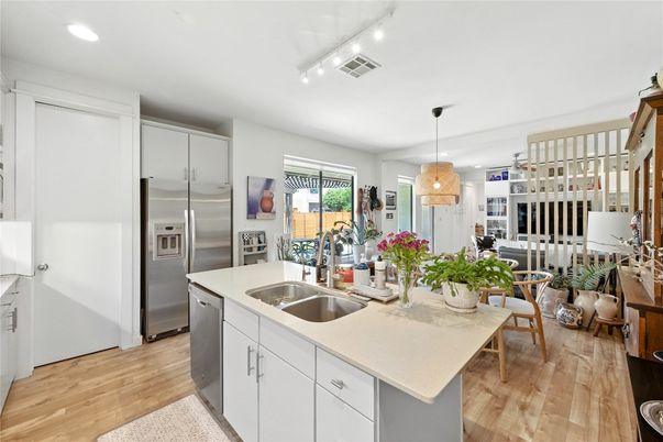 Dining room, Interior, Kitchen, Pendant Lights, Recessed Lighting, Stainless Steel Appliances, Wood Texture Flooring