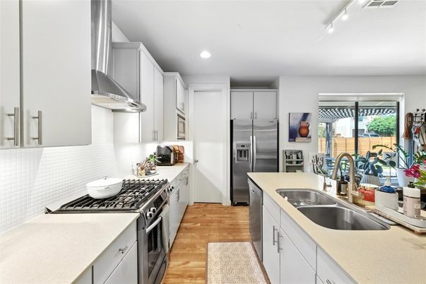 Interior, Kitchen, Recessed Lighting, Stainless Steel Appliances, Wood Texture Flooring