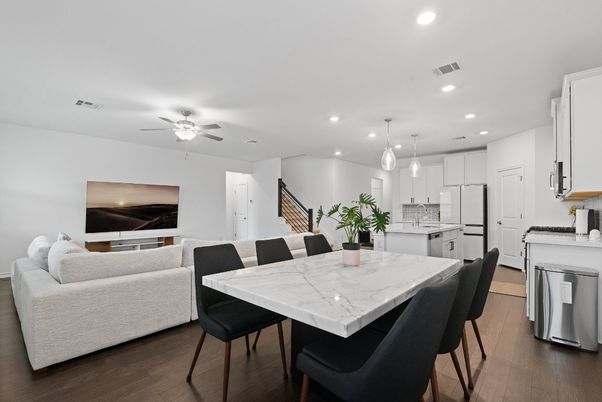 Dining room, Interior, Kitchen, Living room, Pendant Lights, Recessed Lighting, Stainless Steel Appliances, Wood Texture Flooring