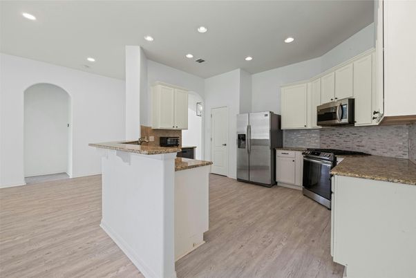 Interior, Kitchen, Recessed Lighting, Stainless Steel Appliances, Wood Texture Flooring